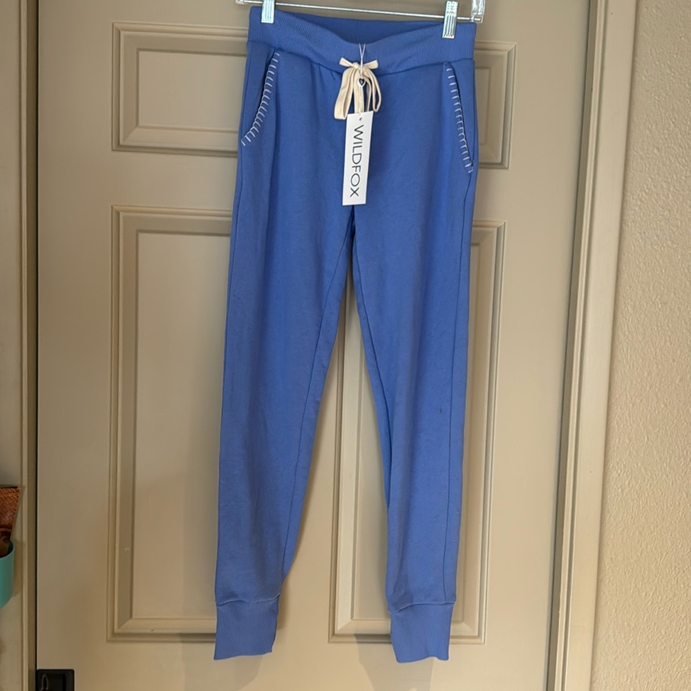 Wildfox lounge pants with white stitches on pockets